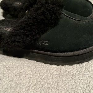 Ugg slip on shoes. Size 10 black fur. Great condition.